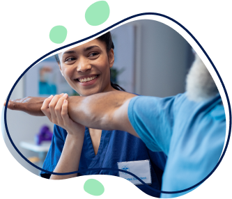 A smiling female physiotherapist helping a senior male patient.